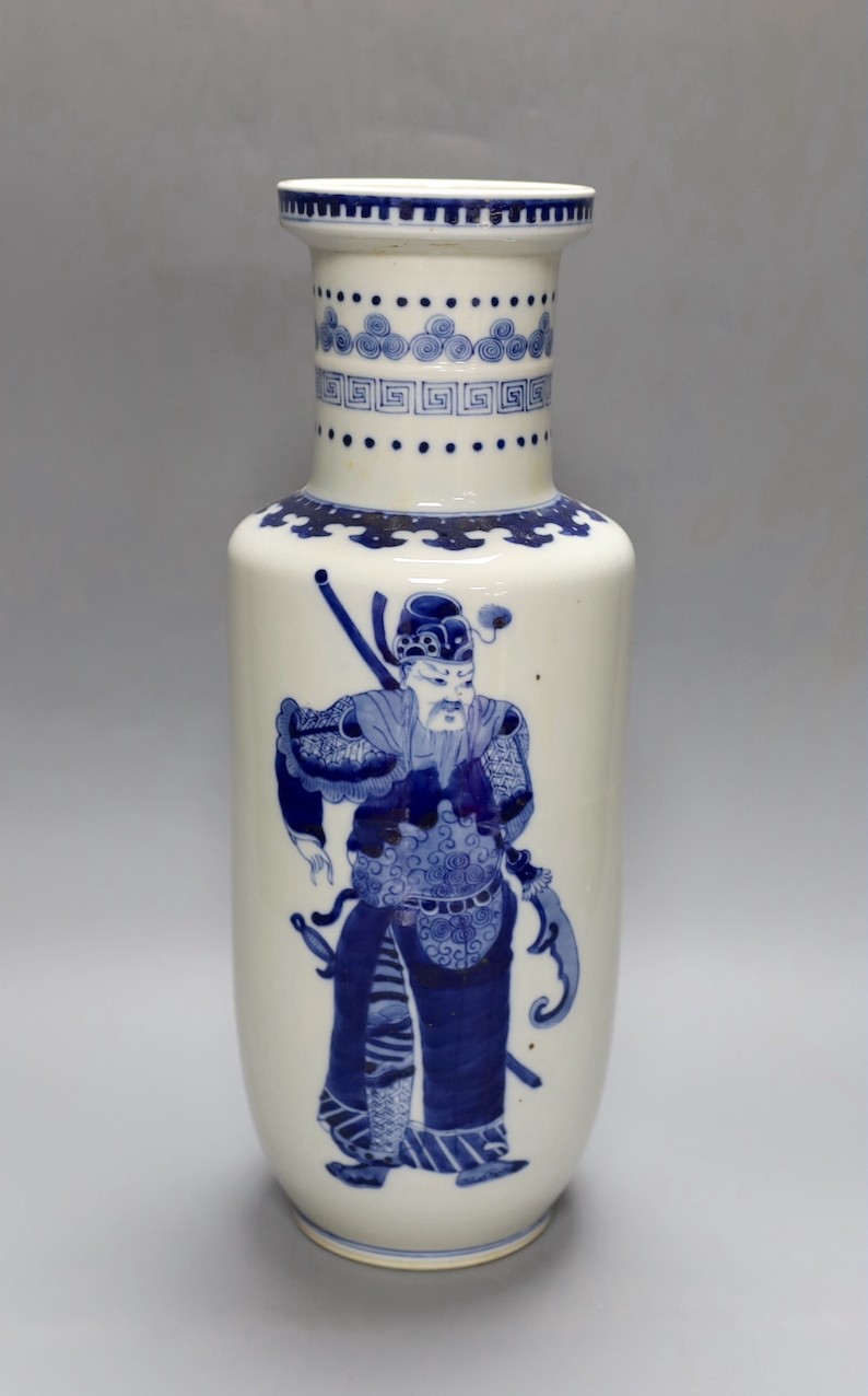 A Chinese blue and white rouleau vase, 35 cms.